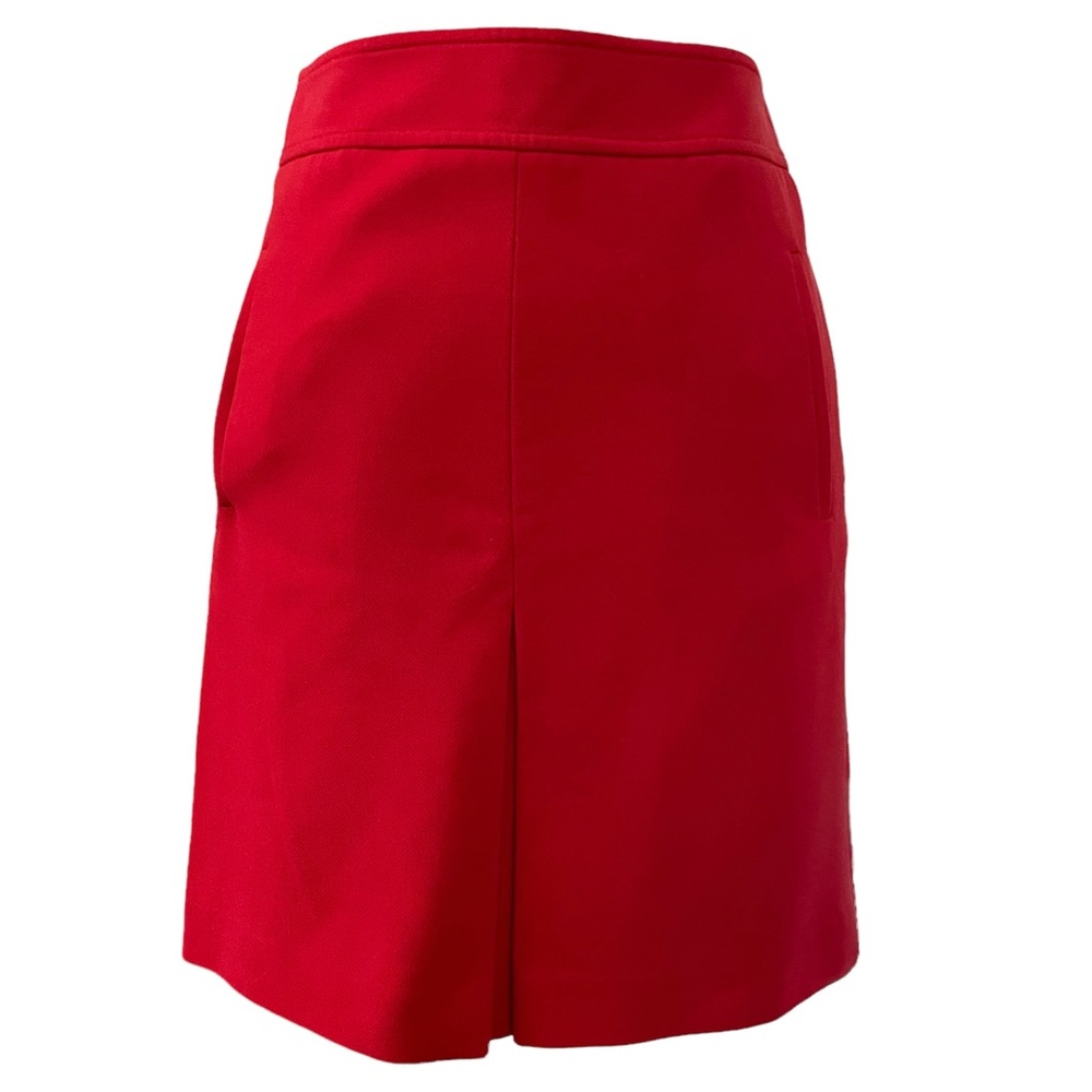size 00P, red pencil skirt,brand new,2 pockets, Dry clean only. Pencil in front.